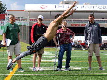 University of Calgary Dinos wide receiver Rashaun Simonise does a broad jump for six NFL scouts at McMahon Stadium in Calgary on Monday July 11, 2016. Simonise has been declared eligible for the NFL supplementary draft.