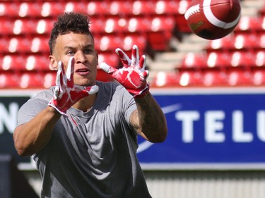 University of Calgary Dinos wide receiver Rashaun Simonise catches passes while being watched by six NFL scouts at McMahon Stadium in Calgary on Monday July 11, 2016. Simonise has been declared eligible for the NFL supplementary draft.