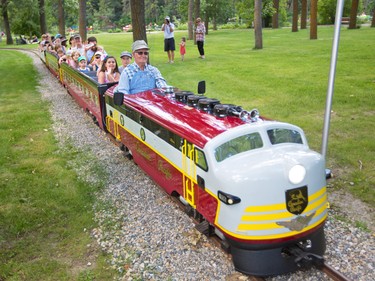 Allan Millard drives the newly restored Bowness Park miniature train on the first official run in Calgary on Thursday July 28, 2016. The train was destroyed in the 2013 floods and had to be completely restored by a team from the Call of the West Museum in High River led by Millard.