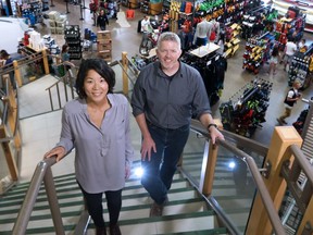 Meriko Kubota, Director of Strategic Partnerships and Community Investment for MEC and Jerry McGillivray, MEC's regional operations manager based in Calgary were photographed in the company's downtown Calgary store on Monday July 18, 2016. MEC has plans to open two more stores in Calgary over the next three years.