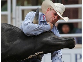 Seth Brockman from Wheatland Wyoming won the Steer Wrestling on Day 2 of the Calgary Stampede Rodeo on Saturday July 9, 2016.
