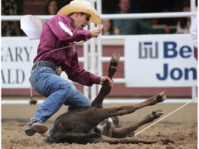 Shane Hanchey from Sulphur Louisiana won the tie-downing roping event on Day 2 of the Calgary Stampede Rodeo on Saturday July 9, 2016.