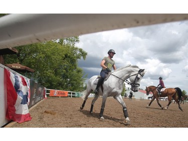 German rider Philipp Weishaupt trains in the sand ring Tuesday July 5, 2016 prior to the Wednesday start of the Spruce Meadows North American.