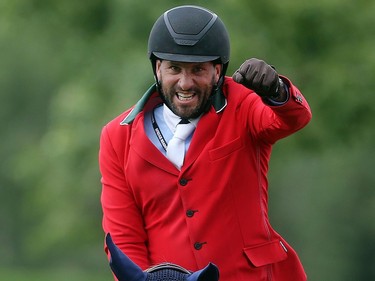 Patricio Pasquel pumps his fist after a strong run on Babel in the ATCO Queen Elizabeth Cup Saturday July 9, 2106 during the North American at Spruce Meadows.