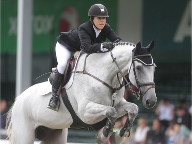 Canadian Elizabeth Gingras rides Zilversprings to a second place finish in the  ATCO Queen Elizabeth Cup Saturday July 9, 2106 during the North American at Spruce Meadows.