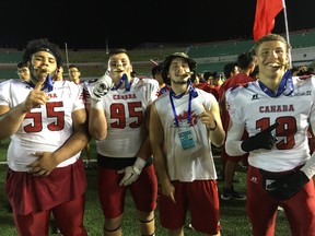 Calgary football players, left to right, J Min Pelley, Skye King, Bowan Lewis and Trey Kellogg were members of Team Canada who won gold at 2016 IFAF U19 world football championships in Harbin, China, on July 10, defeating the United States 24-6.