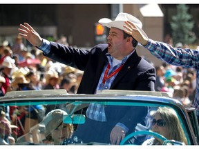 MP Jason Kenney in the Calgary Stampede Parade on Friday July 8, 2016. Mike Drew/Postmedia