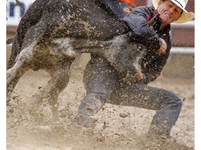 Cody Cassidy from Donald, Ab., pulled down his steer the quickest to take the steer wrestling at the Stampede Rodeo at the Calgary Stampede on Friday July 15, 2016.