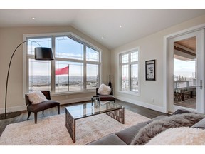 Soaring windows in the family room in the Brixton by Cook Custom Homes in the Point in Patterson Heights.