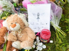 Estella Yamada, who danced with Taliyah Leigh Marsman at the North Calgary Dance Centre, left a message for Taliyah and her mother Sara Bailie outside the residence they lived in.