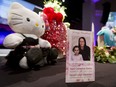 A program sits on a display table before a memorial service for Sara Baillie and her five-year-old daughter Taliyah Marsman at Centre Street Church in Calgary, Alta., on Thursday, July 21, 2016. Baillie and Marsman were killed in mid-July; Edward Downey faces charges. Lyle Aspinall/Postmedia Network