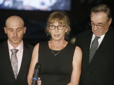 Janet Fredette, Sara Baillie's mother, stands with her husband Ed Fredette (R) and son Michael Baillie as she speaks to media before a memorial service for Baillie and Baillie's five-year-old daughter Taliyah Marsman at Centre Street Church in Calgary.