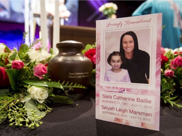 A program sits on a display table before a memorial service for Sara Baillie and her five-year-old daughter Taliyah Marsman at Centre Street Church in Calgary.