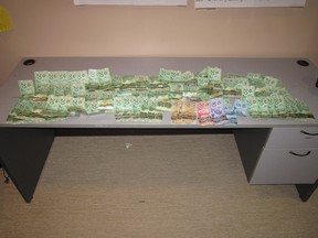 About $2,500 in cash was seized in the arrests on the Blood Reserve.