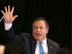 Jason Kenney, PC, MP waves after speaking to media and supporters in Calgary, Alta. on Wednesday July 6, 2016.