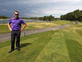 Jeff MacGregor, head golf professional at the Inglewood Golf and Curling Club, poses at the newly rebuilt 9th hole tee box, running along the Bow River, is shown looking north in Calgary, Alta on Tuesday June 28, 2016. Inglewood is one of the busiest courses in Canada and the work on the hole has recently been completed after damage done by flooding 3 years prior.  Jim Wells//Postmedia