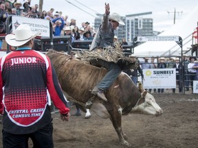 Kale Marks goes for a ride during Ranchman's Renegades Bullbustin' at theRanchman's bar in Calgary, Alta., on Tuesday, July 5, 2016. Kale Marks and Josh Birks tied for the win in the PBR Canada event.R Lyle Aspinall/Postmedia Network