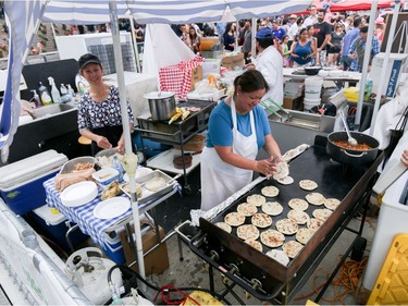 Making pupusas - a Salvadoran specialty - at Fiestival at Olympic Plaza in Calgary, Ab., on Saturday July 23, 2016.