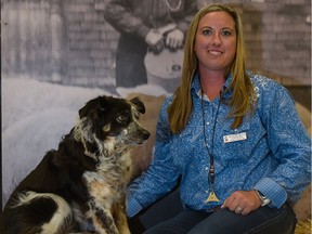 Michelle Bryan and her dog, Meg, who is competing in the World Stock Dog trials at the 2016 Calgary Stampede in Calgary, Alta., on Saturday, July 9, 2016.  Meg was partially paralyzed after an accident but has returned to compete this year.