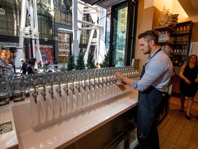 Beer bar at Earls.67, the new restaurant at Bankers Hall in Calgary, July 21, 2016. Mike Drew/Postmedia