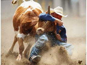 Texas bulldogger K.C. Jones during the steer wrestling event at the Calgary Stampede rodeo on Friday, July 8, 2016. Tyler Waguespack had the fastest time on the day.