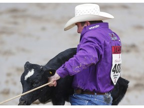 Ryan Jarrett of Summerville, GA, posted the top time ( 7.2 seconds) on Day 8 of the tie-down roping event at the Calgary Stampede rodeo on Friday, July 15, 2016.