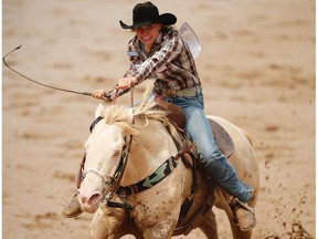 Cayla Melby of Burneyville, OK, sailed around the barrels in a time of 17.21 seconds during Day 8 barrel-racing action at the Calgary Stampede rodeo on Friday, July 15, 2016.