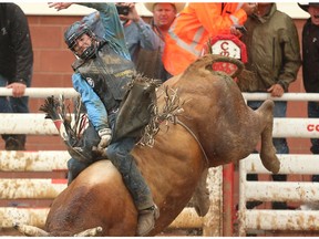 Ponoka, Alberta bullrider Zane Lambert was Day 9 winner in bulls at the Calgary Stampede rodeo on Saturday, July 16, 2016.