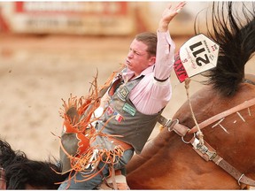 Yvan Jayne rode Twin Cherry to a score of 74.00 on Day 8 at the Calgary Stampede rodeo bareback event on Friday, July 15, 2016.