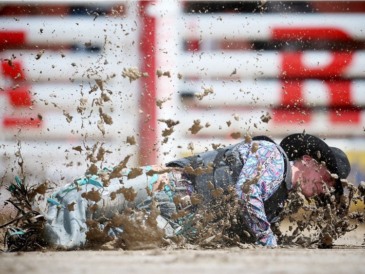 Gallery: A muddy Saturday at the Calgary Stampede Rodeo | Calgary Herald