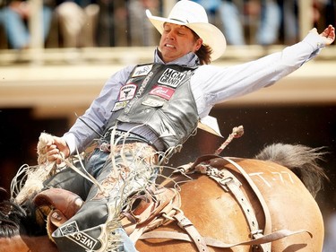 Louisiana cowboy Brad Harter rode Tokyo Bubbles to a score of 79.50 on Day 9 of the saddle bronc event at the Calgary Stampede rodeo on Saturday, July 16, 2016.