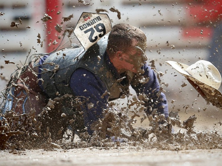 Gallery: A muddy Saturday at the Calgary Stampede Rodeo | Calgary Herald