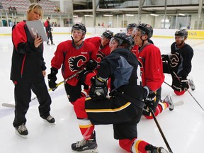 Flames prospects listen to power skating coach Dawn Braid during the Flames development camp at Markin MacPhail Centre in Calgary, Alta., on Tuesday, July 5, 2016. AL CHAREST/POSTMEDIA