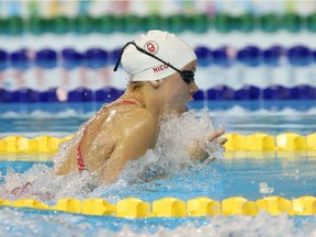 Rachel Nicol, shown here swimming in the heats of the Pan Am Games last year in Toronto, was comforted to qualify for the 2016 Rio Olympics in the same pool where she had won Pan Am silver and bronze the year before. (Courtesy of Swimming Canada/Scott Grant)