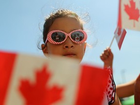 Six-year-old Sofia Mughal during Canada Day celebrations at the Genesisi Centre in Calgary, Alta., on Friday July 1, 2016. Leah Hennel/Postmedia
