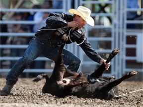 Timber Moore of Aubrey TX  earned $100,000 when he tied up his calf in a time of 8.1 at the Stampede finals on July 12, 2015. Moore will be back in the finals at this year's Stampede.