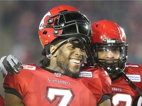 Calgary Stampeders defensive tackle Junior Turner lets out a big smile after an interception at McMahon Stadium in Calgary on Friday, Sept. 18, 2015. Turner missed all of training camp with a shoulder injury, but may be ready to return to the lineup.