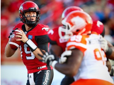 Calgary Stampeders quarterback Bo Levi Mitchell looks to throw the ball during a game against the BC Lions in CFL football in Calgary, Alta., on Friday, July 29, 2016. AL CHAREST/POSTMEDIA