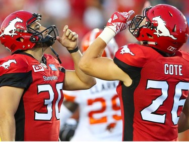 Calgary Stampeders Rene Paredes celebrates with Rob Cote after hitting a 44-yard field goal against the BC Lions during CFL football in Calgary, Alta., on Friday, July 29, 2016. AL CHAREST/POSTMEDIA