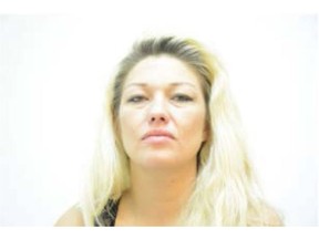 Lori Ann Heavenfire, 34, has been charged in connection to the homicide of Tyler Sanderson, 24, who was fatally wounded May 15, 2016 in the 5500 block of Maddock Drive N.E.