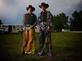 The Nelson brothers, Dawson, 16, left and Keegan, 14, dream of competing in the Professional Bull Riding circuit, but first they're getting seasoned at smaller rodeos like the Nanton Nite Rodeo on July 2, 2016. Keegan will be competing at the Calgary Stampede on July 9. Leah Hennel/Postmedia