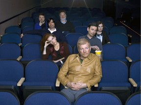 Members of The New Pornographers: Carl Newman, front, second row from left, Neko Case and Kurt Dahle, third row from left, Todd Fancey and Kathryn Calder, back row from left, Blaine Thurier and John Collins. The band plays Thursday at the Calgary Folk Music Festival.