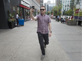 National Post reporter Josh McConnell tries out the new Pokemon Go app in Toronto, Monday July 11, 2016.