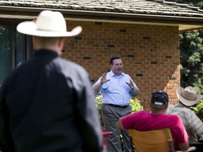 Jason Kenney speaks at a barbecue at the home of Rita Reich on Tuesday, August 16, 2016 near Lacombe . Kenney is travelling around the province as he attempts to unite Alberta.