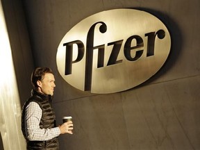File - The Pfizer logo is seen outside an office.