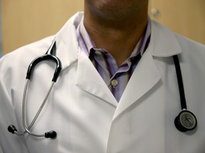 MIAMI, FL - JUNE 02:  A doctor wears a stethoscope as he see a patient for a measles vaccination during a visit to the Miami Children's Hospital on June 02, 2014 in Miami, Florida. The Centers for Disease Control and Prevention last week announced that in the United States they are seeing the most measles cases in 20 years as they warned clinicians, parents and others to watch for and get vaccinated against the potentially deadly virus.  (Photo by Joe Raedle/Getty Images) ORG XMIT: POS2014060311381438 ORG XMIT: POS1506291753533940