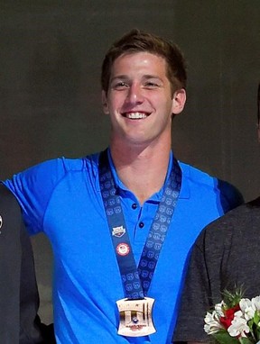 FILE - In this July 3, 2016, file photo, U.S. swimmer Jimmy Feigen smiles during the men&#039;s 400-meter relay team medal ceremony at the U.S. Olympic swimming trials, in Omaha, Neb. Feigen apologized for the &ampquot;serious distraction&ampquot; he and three teammates caused at a gas station during the Rio Olympics, saying he omitted facts in his statement to police. Feigen says in a statement posted Tuesday, Aug. 23, 2016, on the website of his lawyer in Austin, Texas, that &ampquot;I omitted the facts that we urinated b