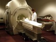 A technician operates an MRI machine at a private clinic in Calgary on Jan. 12, 2005.