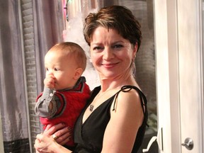 Adrien Gottli (pictured with her grandson Nicholas Gottli in December 2014) died August 8, 2016, after being struck by a woman backing up an SUV in Hawkwood on July 28, 2016.