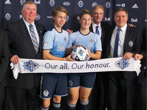 Alberta Soccer, Calgary Minor Soccer Association and Whitecaps FC representatives pose in Calgary, Alta on Tuesday August 9, 2016 following a press conference. The group announced a partnership  with Calgary Minor Soccer and the Alberta Soccer Association to set up an Alberta South academy for players.